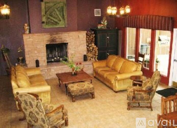 A living room with a fireplace and a couch.