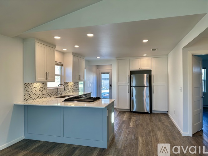 A kitchen with a counter and cabinets.