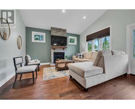 A living room with a fireplace and a couch.