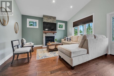 A living room with a fireplace and a couch.