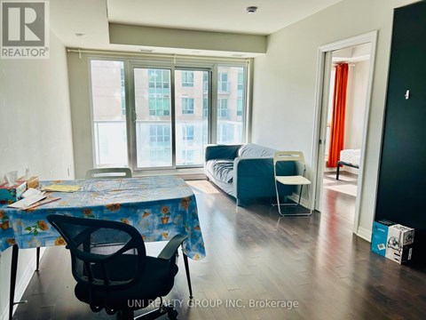 A room with a table and chairs in it.
