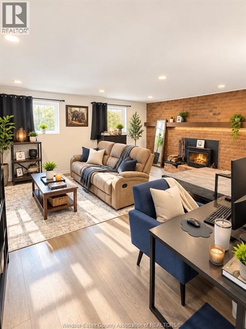 A living room with a fireplace and a couch.