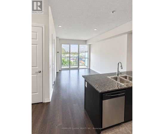 A kitchen with a sink and a dishwasher.