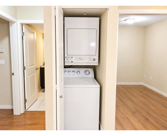 A white dishwasher is installed in a kitchen.