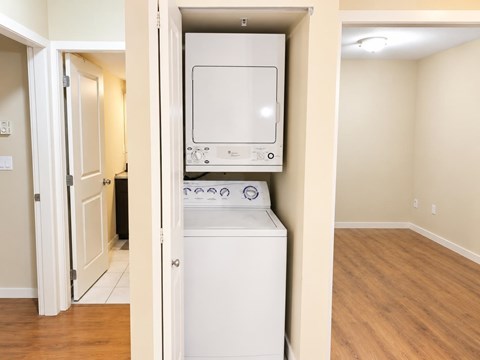 A white dishwasher is installed in a kitchen.