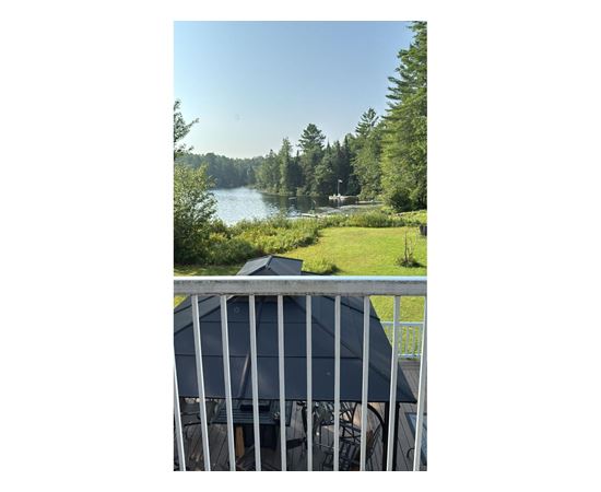 A view of a lake from a balcony.