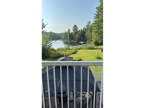 A view of a lake from a balcony.