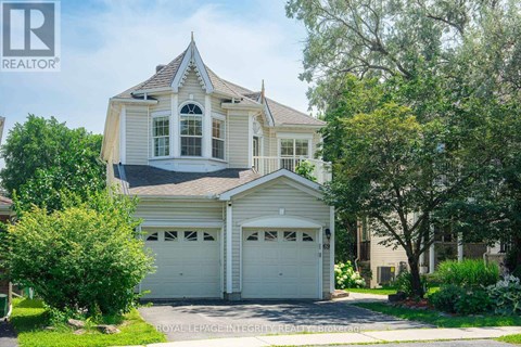 A house with a white garage door is for sale.
