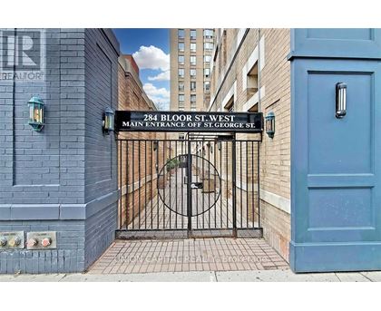 A gate with a sign that says 284 Bloor St. West.