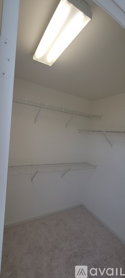 Empty room with a light on the ceiling.