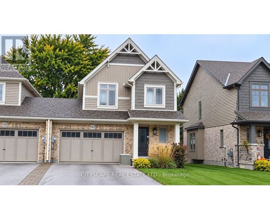 A large, two-story house with a garage is shown.
