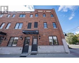 A red brick building with the number 10 on it.
