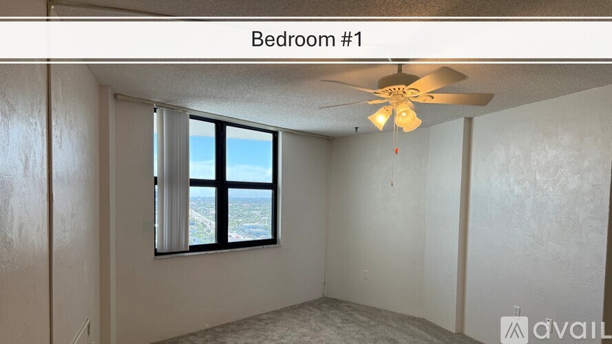 Bedroom #1 has a window with a view of the outdoors.