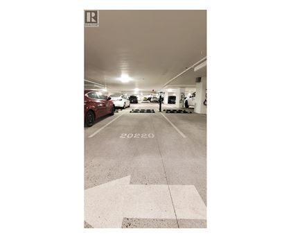 A parking garage with the year 2022 painted on the ground.