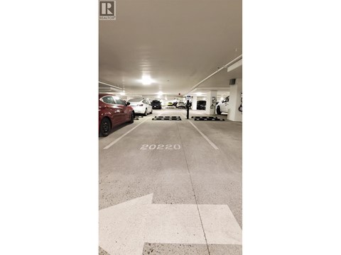 A parking garage with the year 2022 painted on the ground.