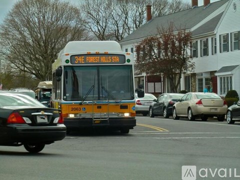 A bus with the number 34E and the destination Forest Hills St.