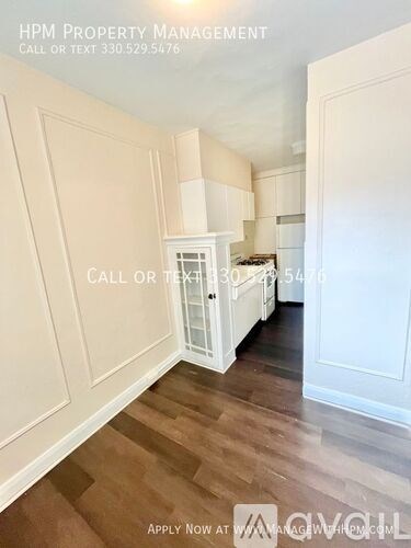 A room with wood flooring and white walls is on the market with HPM Property Management.