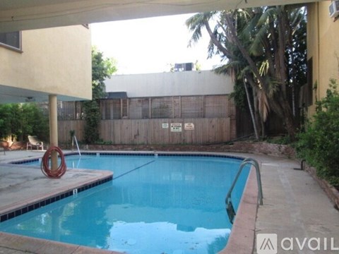 A pool with a red ring in the middle of it.