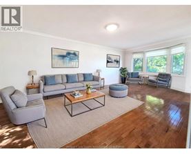 A room with wooden floors and white walls.