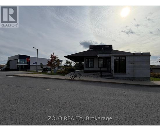 A street view of a building with the text "ZOLO REALTY, Brokerage" on the bottom.