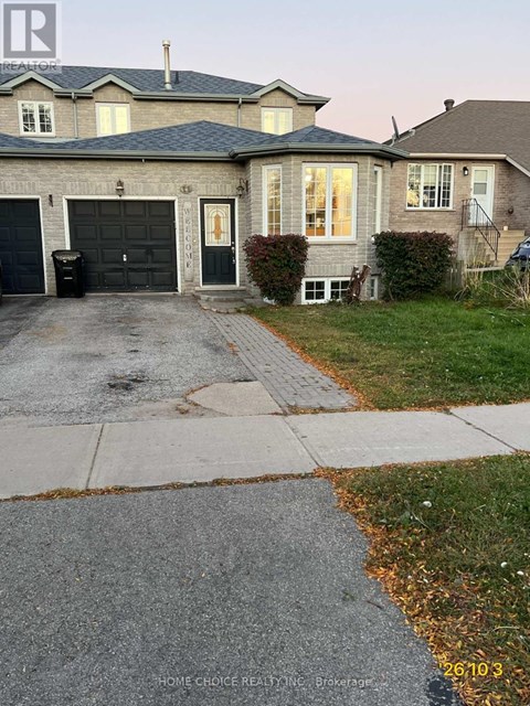 A house with a black garage door is for sale.