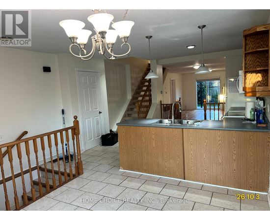 A floor plan for a home with a basement, first floor, and second floor, including a garage and a recreation room.