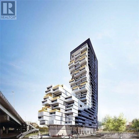 A modern multi-story building with balconies is under construction.