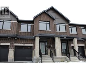 A two-story brick house with a black front door and windows.