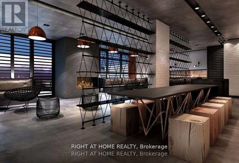 A modern dining room with a long table and chairs.
