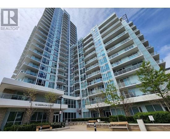 A modern apartment complex with a glass facade and a sign that reads "10 Deerlick Courts".