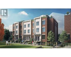 A modern apartment complex with people walking around the courtyard.
