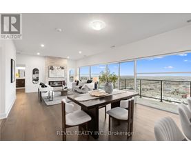 A modern dining room with a view of the city.