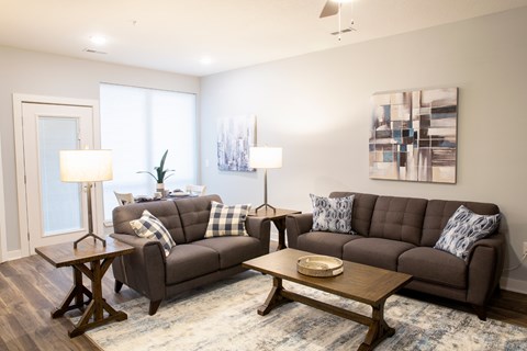A living room with two couches and a coffee table.