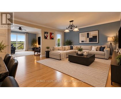 A spacious living room with a large couch and a coffee table.