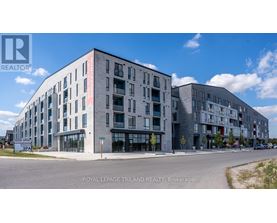 A building with a sign that says "Royal LePage Triland Realty, Brokerage".