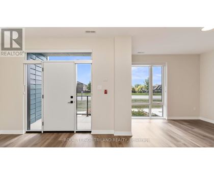 A realtor's office with a view of the outside.