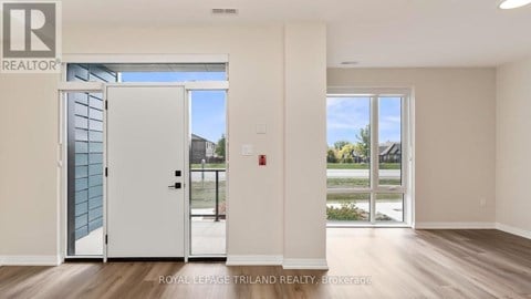 A realtor's office with a view of the outside.