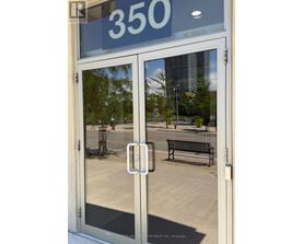 The door has a glass window and a handle.