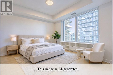 A bedroom with a large bed and a window overlooking a building.