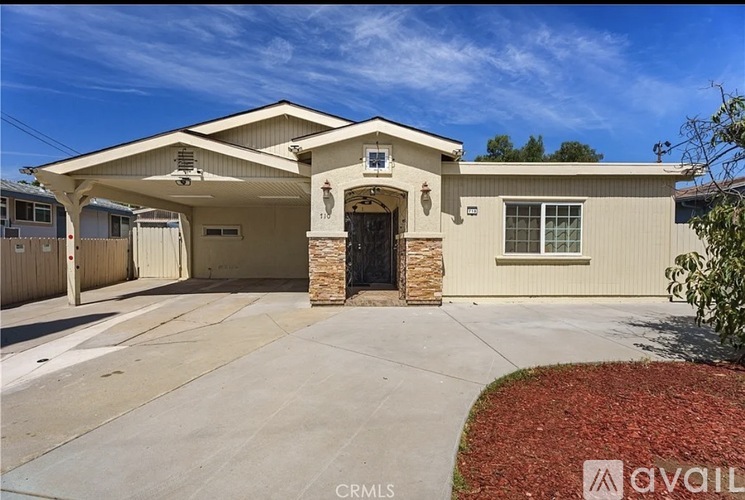A house with a CRMLS logo on the bottom left corner.