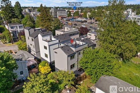 An aerial view of a building with a red pin pointing to a location labeled "Robert Eagle Staff Middle School".