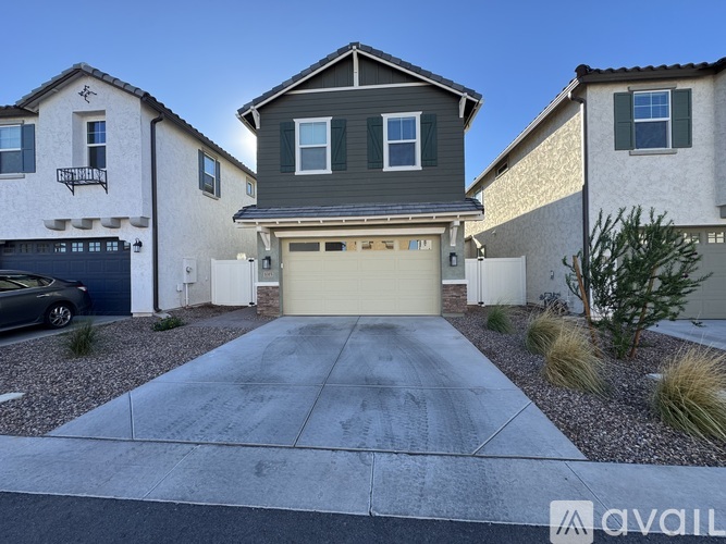 A house with a garage is available for sale.