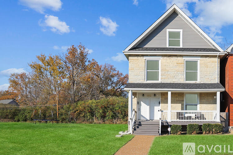 A house with a white door and a porch.