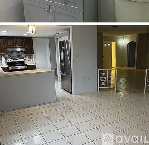 A kitchen with a refrigerator, stove, and oven.