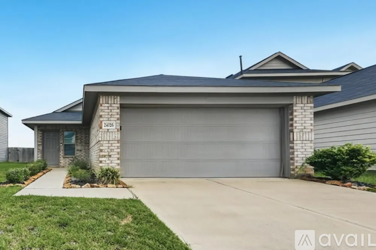 A house with a garage door that says "Available" on it.