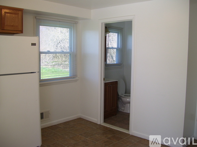 A small room with a toilet in it.