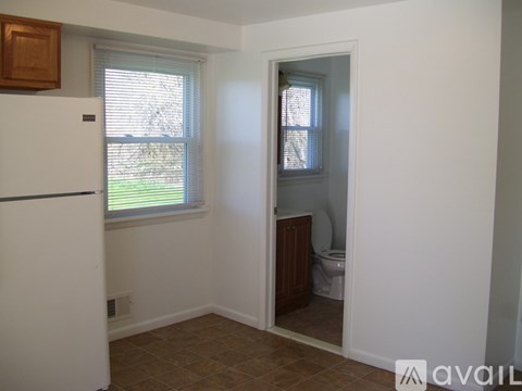 A small room with a toilet in it.