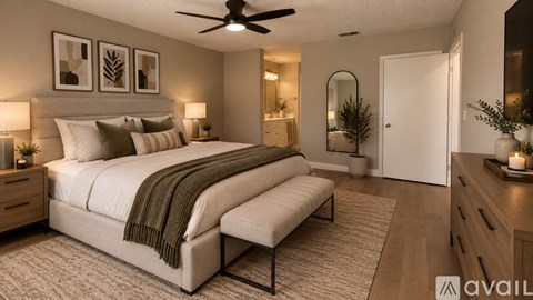 A well-lit bedroom with a large bed, a bench, and a vanity with a mirror.