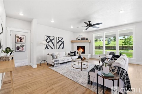 A living room with a fireplace and a couch.