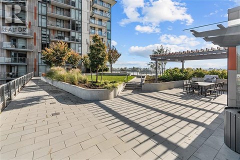 A sunny day at the rooftop patio of a residential building.